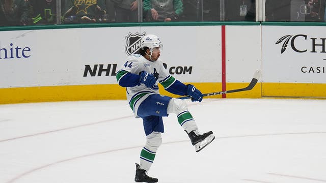 Sherwood’s OT goal caps Canucks 3-goal comeback in final minute in 6-5 win over Stars