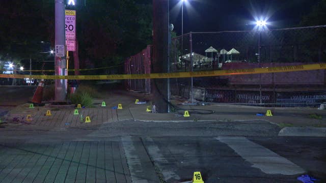 Man and woman shot outside Dallas store; suspect at large