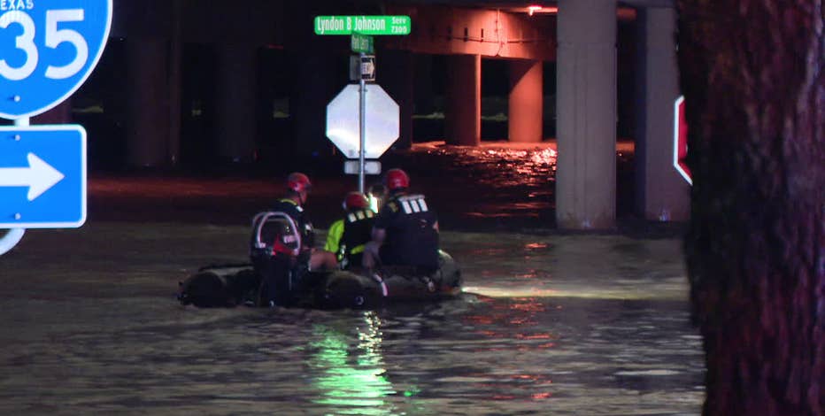 Man dies after truck trapped in rising Dallas floodwaters; Water rescue boat capsizes from rapid currents