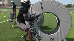 Donated tackle wheels help Mansfield ISD football players practice safely