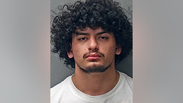 Fort Worth man shot through apartment door early Sunday morning