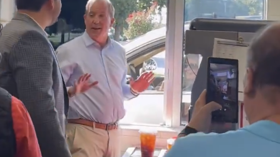 Texas AG Ken Paxton serves up burgers at Plano McDondalds