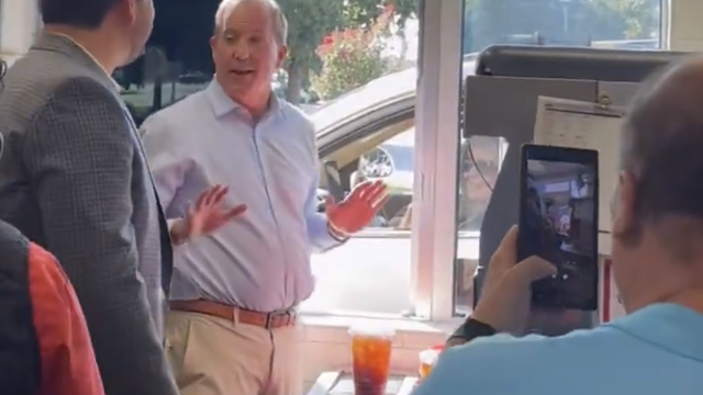 Texas AG Ken Paxton serves up burgers at Plano McDondalds