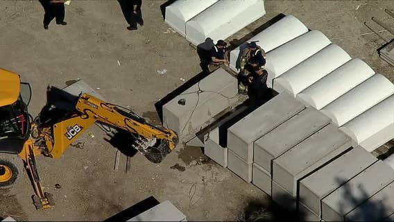 Dallas worker pinned by falling burial vault dies from injuries, Dallas Fire-Rescue says