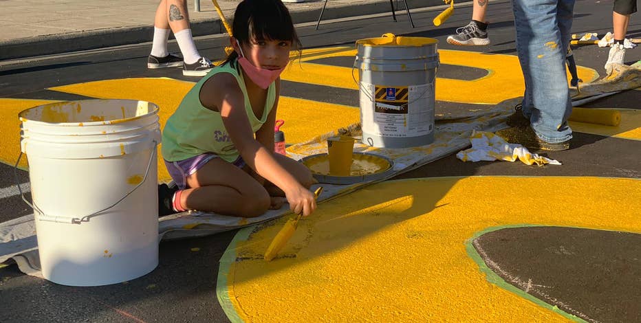 Texas city removes 'Defund the Wall' mural after Abbott's threat to pull road funds