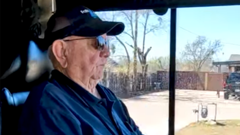 Raymond Hager, 95, drives a bus in Wichita Falls, Texas, in November 2025. He was recognized as the world's oldest active male bus driver by the Guinness Book of World Records.