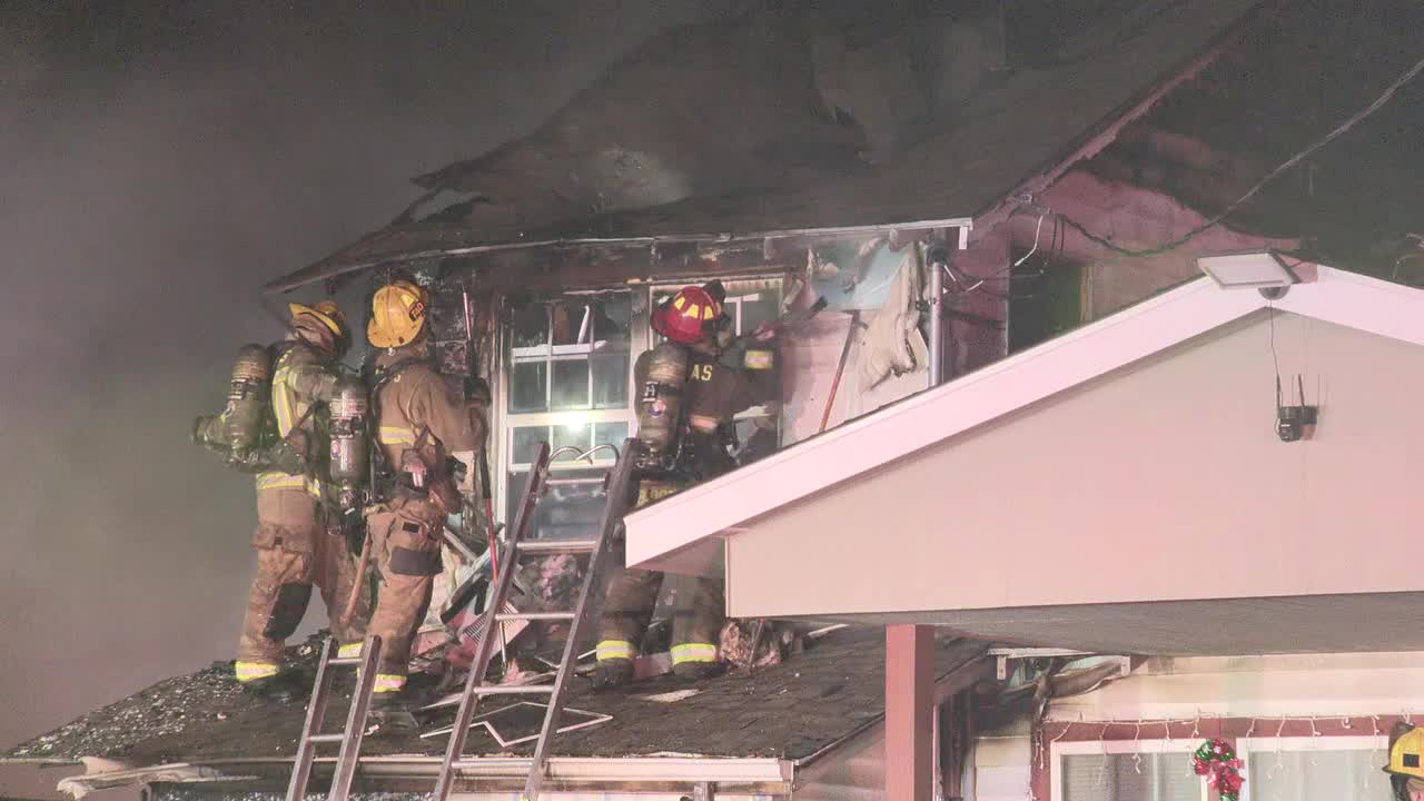 Two homes damaged in early-morning Dallas fire, residents and pets escape