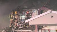 Two homes damaged in early-morning Dallas fire, residents and pets escape