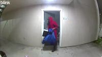 Video shows burglar in red robe stealing all of Dallas man’s belongings