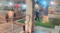 Watch: Man rips Christmas lights off tree outside Dallas business