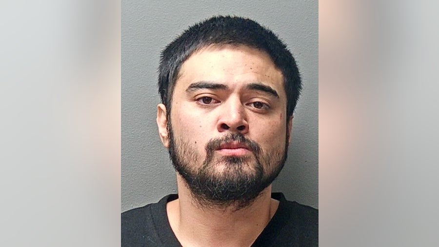 Fort Worth man arrested after allegedly chasing, shooting at woman's car