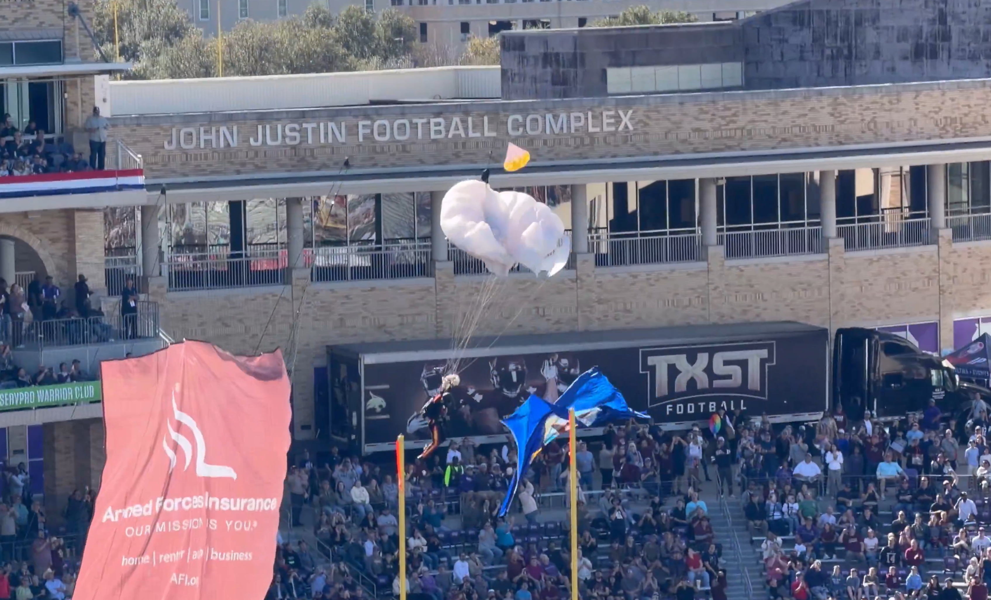 Watch: Paratrooper falls from field goal net at Armed Forces Bowl in Fort Worth