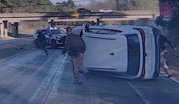 Watch: Car flips during chase with Texas officials