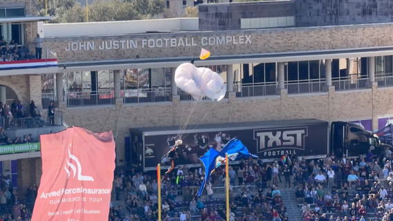 Watch: Paratrooper falls from field goal net at Armed Forces Bowl in Fort Worth