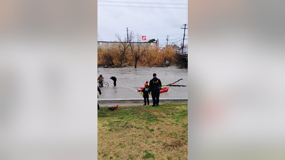 2 men rescued from Cottonwood Creek after being trapped by rising waters