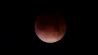 PHOTOS: 'Blood moon' total lunar eclipse glows over North Texas