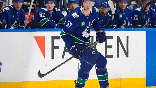 Stars acquire Texas-born defenseman from Canucks for two draft picks