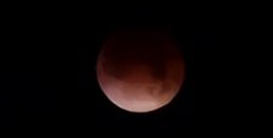PHOTOS: 'Blood moon' total lunar eclipse glows over North Texas