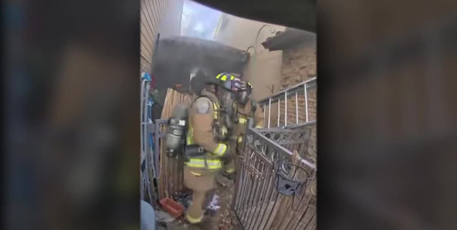 Carrollton firefighters rescue woman from second story of narrow, burning apartment