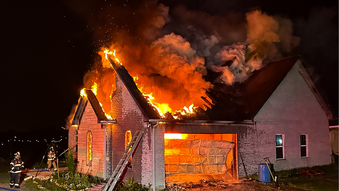 Firefighters from four departments battle house fire near Terrell