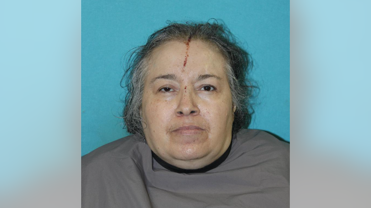 Carrollton woman arrested after husband found stabbed in burning home