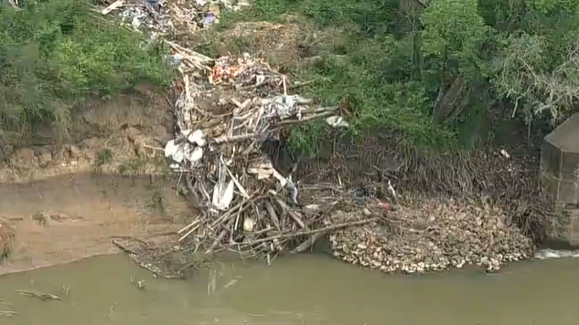 Dallas still working on plan to clear large illegal trash dump on Trinity River