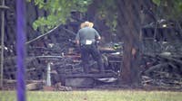 Deputy shot in the face as gunman opens fire at scene of trailer home fire