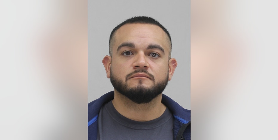 Dallas police officer arrested for evading arrest in prostitution case