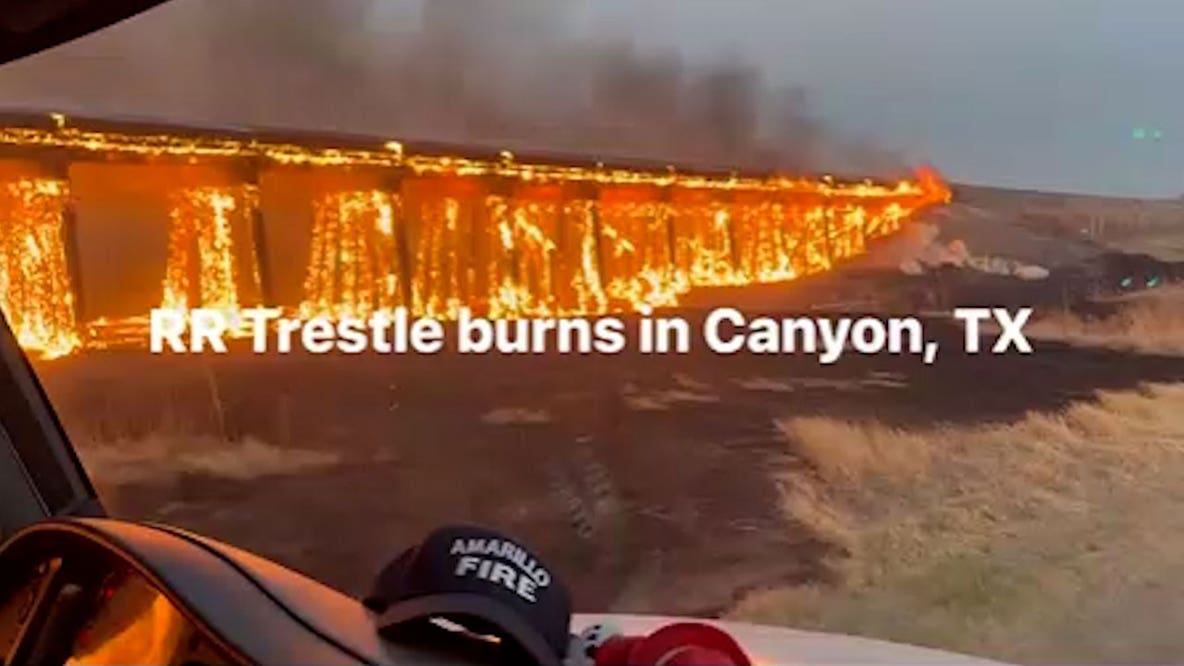 WATCH: Train trestle burns as wildfires rage in Texas Panhandle