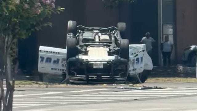 Dallas police officer, driver hospitalized after patrol car flips in crash
