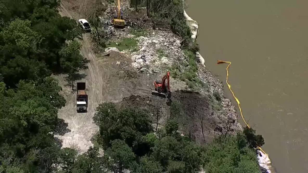 Dallas begins cleanup at Trinity River illegal dump site