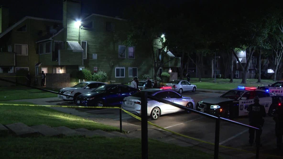 Dallas shooting: Woman killed in crossfire in courtyard of condo complex