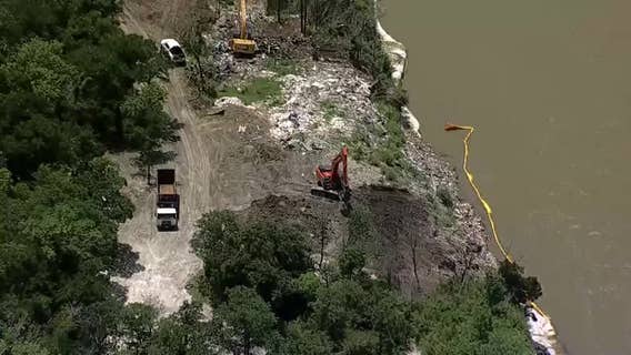 Dallas begins cleanup at Trinity River illegal dump site