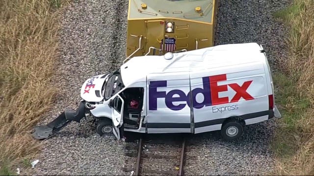 Train slams into FedEx truck in Texas killing 1, injuring another