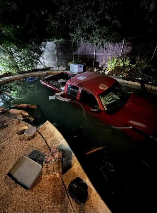 Pickup truck crashes into pool at home in The Colony; driver flees