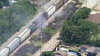 Fire burns along train tracks in Fort Worth