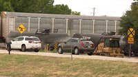 Roads, train tracks reopen near site of Mansfield train derailment as clean-up continues