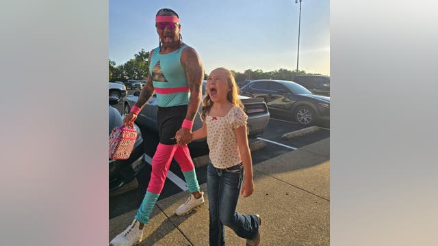 North Texas dad dresses like 80s fitness instructor to drop his kids off on their first day