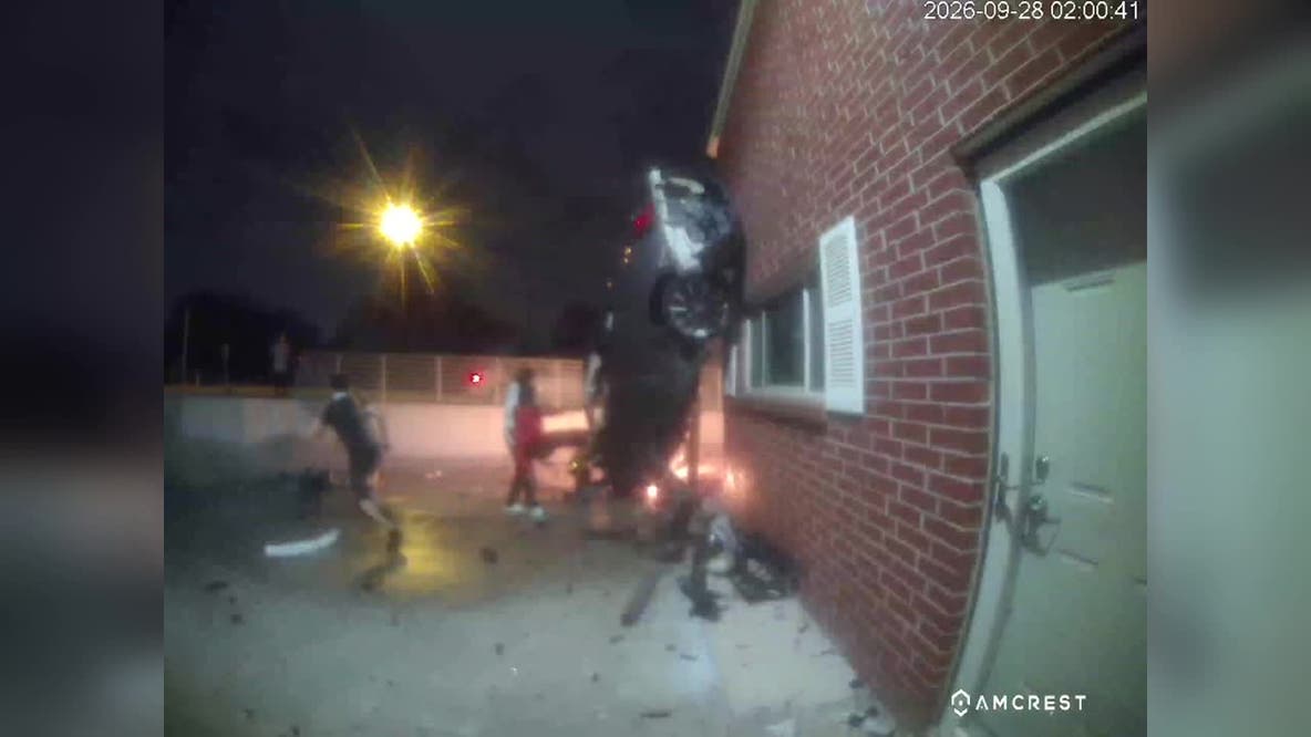 Video: Car slams into Far North Dallas building before catching fire