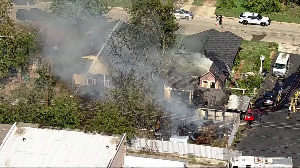 Fort Worth fire damages home and sheds