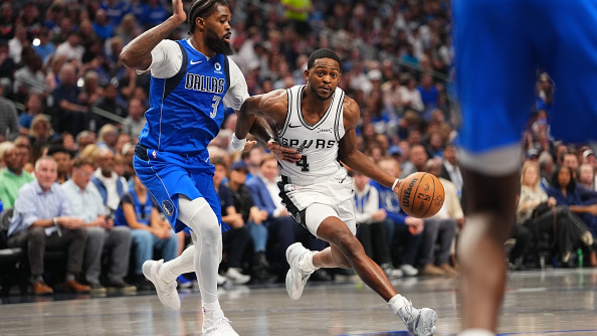 Short-handed Mavericks lose 122-106 to Spurs in home opener