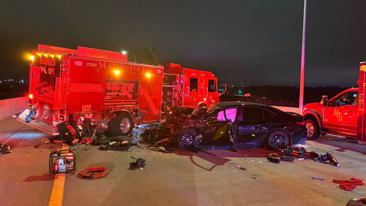 Mansfield fire engine hit by vehicle while blocking traffic on State Highway 360