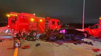 Mansfield fire engine hit by vehicle while blocking traffic on State Highway 360
