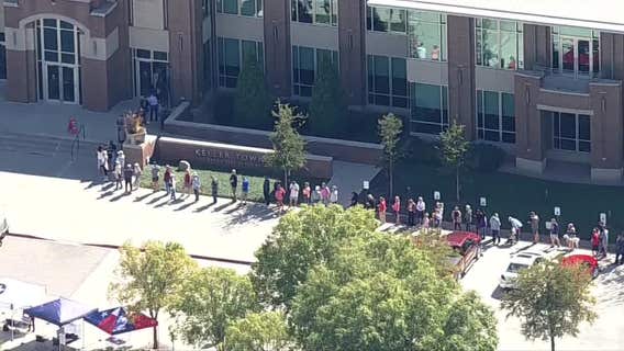 North Texas early voting begins with long lines at some polling locations