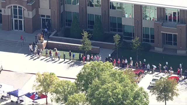 North Texas early voting begins with long lines at some polling locations