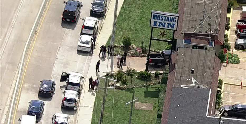Armed suspect dies from self-inflicted gunshot during Dallas police warrant operation at motel