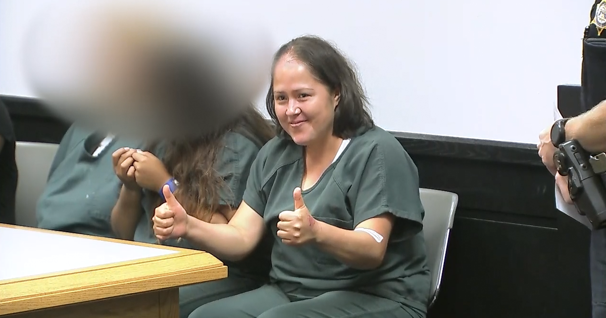 Woman accused of killing husband, 4 children behaves oddly in first ...