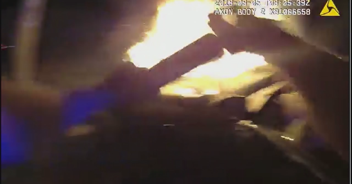 Atlanta police officer rescues man from burning car | FOX 5 Atlanta