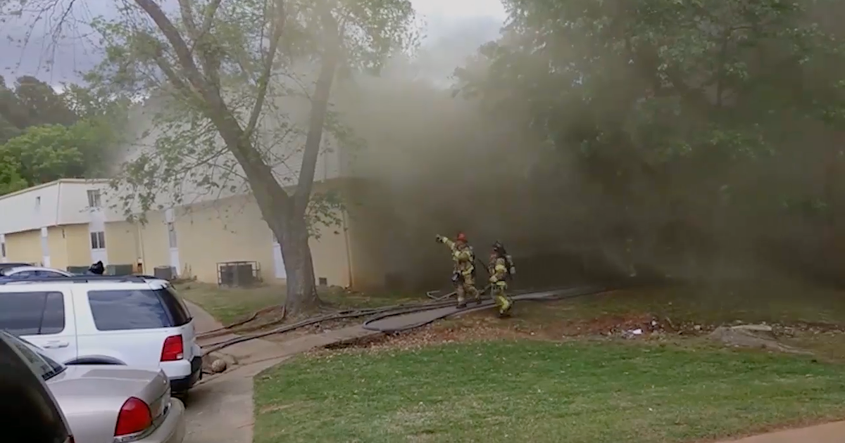 Firefighter catches baby from burning building | FOX 5 Atlanta