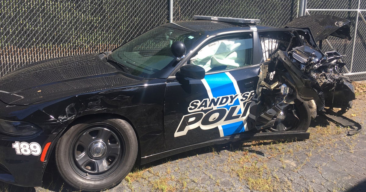 Officer narrowly avoids death after car totaled in crash | FOX 5 Atlanta